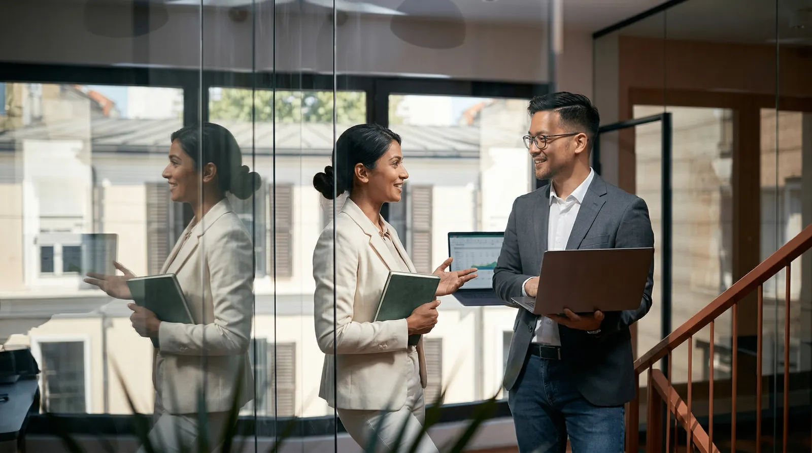 Two colleagues presenting compliance strategy
